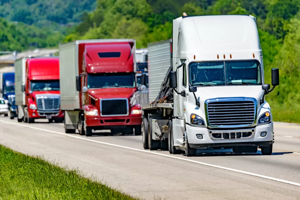 Line of 18-wheeler trucks on a highway in Tennessee